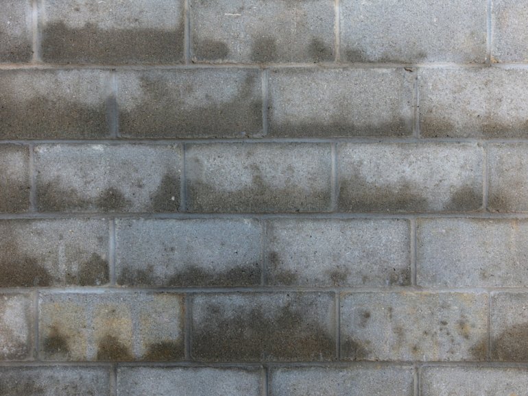 brown and gray brick wall